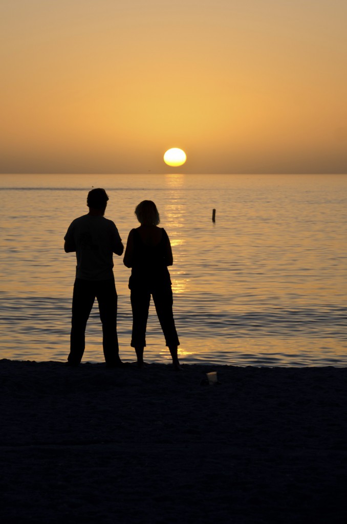 Couple enjoying Sanibel Island sunset