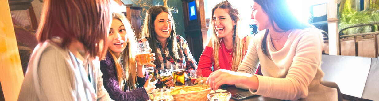 smiling-women-enjoying-a-social-drink