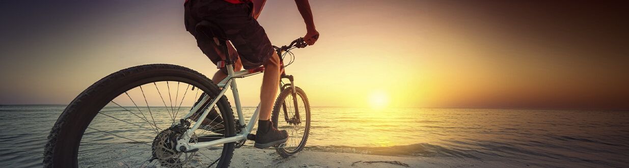 Port-Sanibel-Biking-on-the-beach